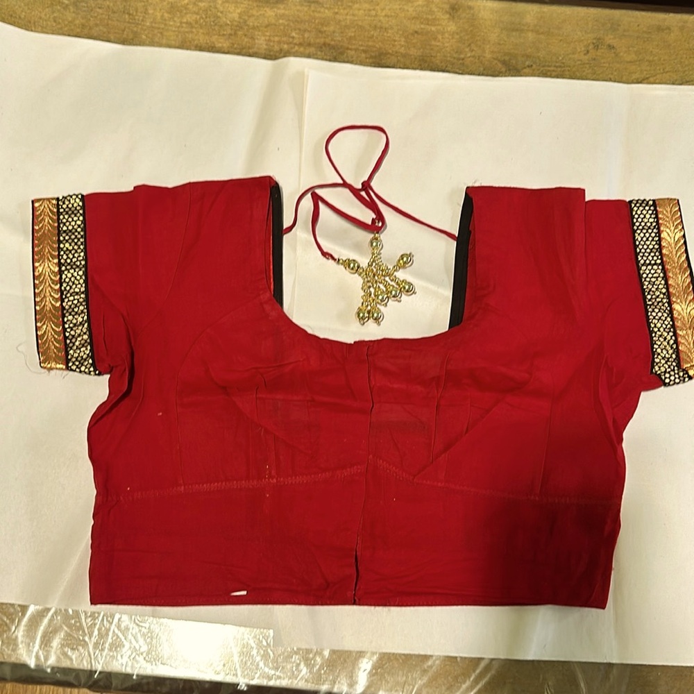 Indian saree blouse brand new, ready-made red color with copper gold design.